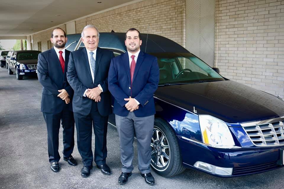 transportation funeral herse and employees